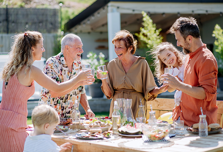 family outdoors celebrating together retirement savings strategies