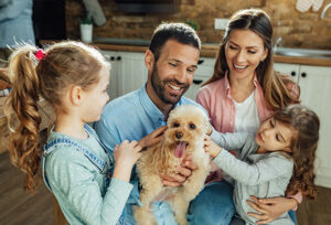 happy family with dog smiling retirement income strategies